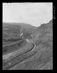 [Untitled photo, possibly related to: World's largest open pit mine, Hull Rust Mahoning. Near Hibbing, Minnesota]. Sourced from the Library of Congress.