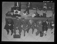 Washington, D.C. Greyhound bus terminal on the day before Christmas. Soldiers and civilians waiting for buses. Sourced from the Library of Congress.