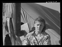 Newton County, Missouri. Camp Crowder area. Wife of construction worker from Oklahoma living in tent along U.S. Highway No. 71. Sourced from the Library of Congress.