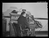 Oran, Missouri. Doctor receiving call in his office. Sourced from the Library of Congress.