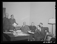 [Untitled photo, possibly related to: Athens, Ohio. H.D. Palmer, executive director of the civilian defense council, addressing a meeting of the utilities division, including representatives of power, gas, electric, telephone companies]. Sourced from the Library of Congress.