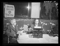 Marietta, Ohio. Old lawyer, veteran of Spanish-American War, registering for civilian defense in basement of the courthouse. Sourced from the Library of Congress.