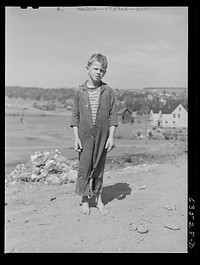 Boy who lives in Houghton, Michigan. Copper range town. Sourced from the Library of Congress.