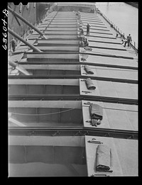 [Untitled photo, possibly related to: Loading grain boat at Consolidated Elevator Compamy, elevator "E". Duluth, Minnesota]. Sourced from the Library of Congress.