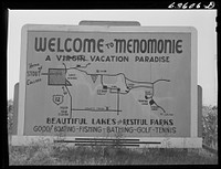 Sign on outskirts of Menomonie, Wisconsin. Sourced from the Library of Congress.