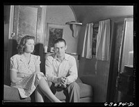 Mr. and Mrs. Wicks. Mr. Wicks is employed at the Ford bomber plant near Ypsilanti. They are from Flint, Michigan. They share a tent and a trailer with another family and single man in Edgewater Park near the bomber plant. Sourced from the Library of Congress.