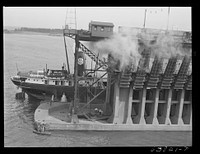 Lake boat pulling into ore docks at Allouez, Wisconsin. Sourced from the Library of Congress.