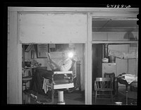 [Untitled photo, possibly related to: Hettinger, North Dakota. Barber]. Sourced from the Library of Congress.