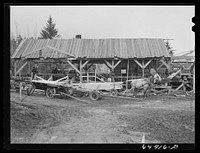Kalispell, Montana. Flathead Valley special area project cooperative sawmill is operated by FSA (Farm Security Administration) borrowers. Wages for employment here is received in lumber for building repairs on houses and builidings. Sourced from the Library of Congress.