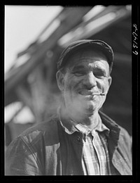 Kalispell, Montana. Worker at FSA (Farm Security Administration) cooperative sawmill. Sourced from the Library of Congress.