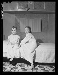 Burlington, Iowa. Acres unit, FSA (Farm Security Administration) trailer camp. Cecil Patrick's kids going to bed in their trailer for workers at Burlington ordnance plant. Sourced from the Library of Congress.