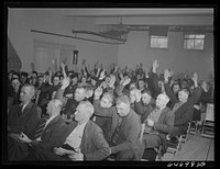 Williston, North Dakota. Farmers' union meeting with the county commissioners to protest the selling of land to corporation farms in Williams County and to discuss the protection of the family-size farm. Sourced from the Library of Congress.