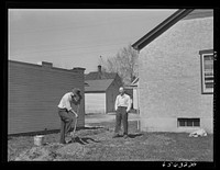 Missoula, Montana. Digging up ground for backyard garden. Sourced from the Library of Congress.