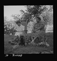 [Untitled photo, possibly related to: Two  supervisors and borrower talk over the home problem. Saint Mary's County, Maryland]. Sourced from the Library of Congress.