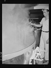 [Untitled photo, possibly related to: Tomato juice is boiled in open vats and then piped to the canning room. Phillips Packing Company, Cambridge, Maryland]. Sourced from the Library of Congress.
