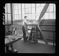 [Untitled photo, possibly related to: Balancing propeller. Hamilton propeller plant, East Hartford, Connecticut]. Sourced from the Library of Congress.