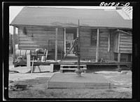 Cement capping has been laid around filled well to stop seepage from surface water. John Hardesty well project, Charles County, Maryland. Sourced from the Library of Congress.