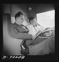 Readers Digest, Colliers, Life, Look and Peek and then the timetable, help to pass the time aboard a Southern Railway pullman somewhere in Georgia. Sourced from the Library of Congress.