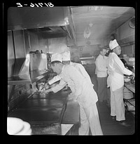 Grill in Washington Hot Shoppe restaurant at midnight. They have outdoor curb service at the Hot Shoppe. Washington, D.C.. Sourced from the Library of Congress.