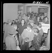Men waiting to enlist at recruiting headquarters in San Francisco, California. Sourced from the Library of Congress.