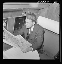 [Untitled photo, possibly related to: Passenger aboard an American airliner enroute from Washington to Los Angeles]. Sourced from the Library of Congress.