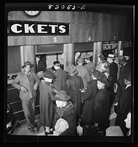 [Untitled photo, possibly related to: Washington, D.C. Christmas rush in the Greyhound bus terminal]. Sourced from the Library of Congress.