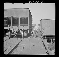 [Untitled photo, possibly related to: Coal cars unloading at the port of Oswego, New York]. Sourced from the Library of Congress.