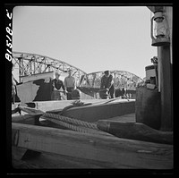 Barger being pulled through by winch, prior to picking up towline from tug. Erie Canal, New York. Sourced from the Library of Congress.
