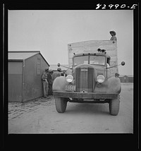 [Untitled photo, possibly related to: Bridgeton, New Jersey. FSA (Farm Security Administration) agricultural workers' camp. Migrant leaving camp for the fields at 5:30 a.m.]. Sourced from the Library of Congress.