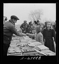 Lancaster County, Pennsylvania. Amish, Mennonite and Pennsylvania Dutch children all patronized the candy stand at this farm auction by John Collier Jr.