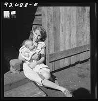 [Untitled photo, possibly related to: Migrant laborer's family. Belle Glade, Florida]. Sourced from the Library of Congress.