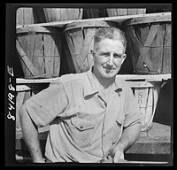 Albion, New York (vicinity). Charles R. Nesbitt who hired the Friend family to work on his farm at forty cents an hour, with a five cents an hour bonus if they stay thirty days. Sourced from the Library of Congress.