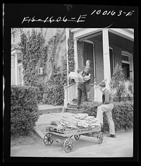 Schoolboys go voluntarily from house to house collecting scrap paper in connection with the campaign in the District schools. Washington, D.C.. Sourced from the Library of Congress.