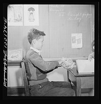 Washington, D.C. Scrap salvage campaign, Victory Program. Washington schoolchildren also collect string to tie their bundles of scrap paper. In the meantime they studied the history and manufacture of string. Sourced from the Library of Congress.