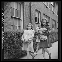 [Untitled photo, possibly related to: Washington, D.C. Scrap salvage campaign, Victory Program. Children bringing their weekly contribution of scrap paper to school]. Sourced from the Library of Congress.