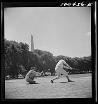 [Untitled photo, possibly related to: Washington, D.C. One of the amateur baseball games between teams representing restaurants, garages, government workers, etc. which go on every afternoon in summer, and especially on Sunday, on diamonds in the Ellipse]. Sourced from the Library of Congress.