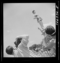 [Untitled photo, possibly related to: Washington, D.C. Publicity photographer and model at the municipal swimming pool on Sunday]. Sourced from the Library of Congress.