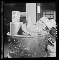 Washington, D.C. Scrap salvage campaign, Victory Program. Metal eagle from ship is among objects stored in warehouse of wholesale junk dealer. Sourced from the Library of Congress.