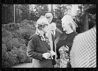 Washington, D.C. Mrs. Henry Morgenthau, wife of the Secretary of the Treasury, chatting with Mrs. Maxim Litvinoff at a garden party at the New Zealand Legation. Sourced from the Library of Congress.