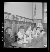 Washington, D.C. Free morning lunch in the kindergarten of a  school. Sourced from the Library of Congress.