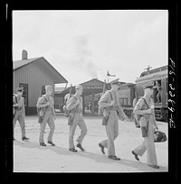 [Untitled photo, possibly related to: Parris Island, South Carolina. U.S. Marine Corps glider detachment training camp. Recruits on their way to the camp]. Sourced from the Library of Congress.
