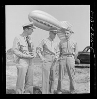 Parris Island, South Carolina. Brigadier General Emile Moses talking over barrage balloon tactics with a Marine Corps lieutenant and a Navy lieutenant at the U.S. Marines Corps glider detachment training camp. Sourced from the Library of Congress.