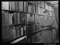 Bob Aden in the library. University of Nebraska, Lincoln. Sourced from the Library of Congress.