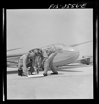 Parris Island, South Carolina.  Lieutenants of Marine Corps, studying glider pilotage, compare notes before a flight. Sourced from the Library of Congress.