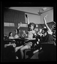 Greenbelt, Maryland. Federal housing project. Third grade children have a discussion. Sourced from the Library of Congress.