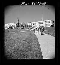 [Untitled photo, possibly related to: Greenbelt, Maryland. Federal housing project. Children going home from school]. Sourced from the Library of Congress.