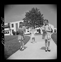 [Untitled photo, possibly related to: Greenbelt, Maryland. Federal housing project. Children going home from school]. Sourced from the Library of Congress.