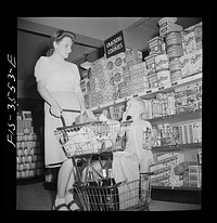 Greenbelt, Maryland. Federal housing project. Shopping in the cooperative grocery store. Sourced from the Library of Congress.