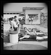 Greenbelt, Maryland. Sun bathers at the swimming pool. Sourced from the Library of Congress.