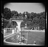 Greenbelt, Maryland. Swimming pool. Bathers pay admittance according to age. Season tickets are obtainable by families. Sourced from the Library of Congress.